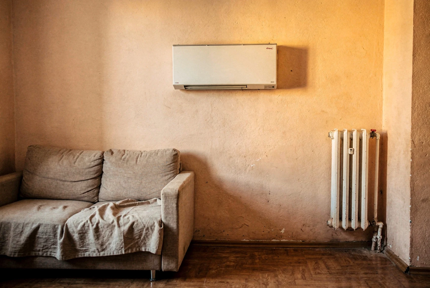 Typical Tbilisi apartment living room with a wall-mounted heating unit