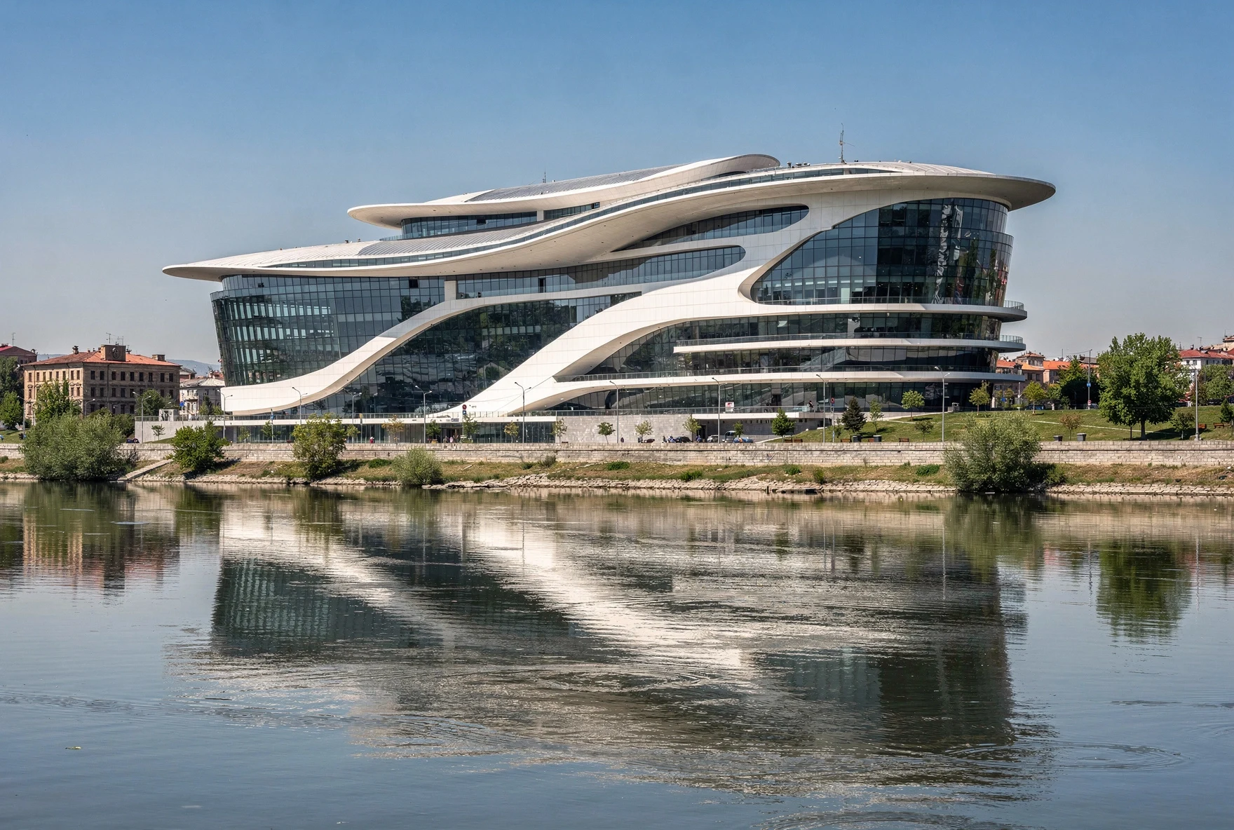 Modern glass Public Service Hall building in Tbilisi along the Mtkvari river